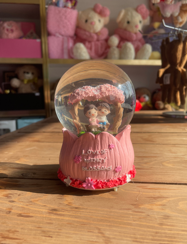 گوی موزیکال چراغدار طرح دختر و پسر سایز متوسط